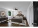 Inviting bedroom showcasing a comfortable bed, matching nightstands, and natural light, creating a peaceful atmosphere at 2601 Pinewood Rd, Gastonia, NC 28054