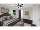 Comfortable bedroom with a ceiling fan, a large window and stylish furnishings, providing a relaxing retreat at 2601 Pinewood Rd, Gastonia, NC 28054