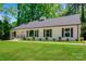 Well-kept home featuring a freshly cut lawn, new landscaping, and white exterior paint at 2601 Pinewood Rd, Gastonia, NC 28054