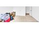 Spacious bedroom featuring neutral carpet, ample storage, and bright lighting, offering a versatile space at 3153 Pinehills Way, Mount Holly, NC 28120