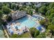 Aerial view of community pool and water park surrounded by lush landscaping at 3306 Delamere Dr, Matthews, NC 28104