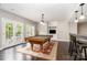 Basement with a pool table, kitchenette, and patio access via the white french doors at 3306 Delamere Dr, Matthews, NC 28104