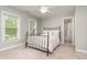 Cozy bedroom with natural light and an ensuite bathroom at 3306 Delamere Dr, Matthews, NC 28104