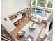 Open-concept living space with a pool view, modern kitchen, and stylish seating areas at 3306 Delamere Dr, Matthews, NC 28104