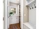 Functional mud room with built-in storage, a window for natural light, and coat hooks at 3306 Delamere Dr, Matthews, NC 28104