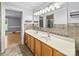 Bathroom features a double sink vanity, and stylish mirror at 3546 Mount Pleasant N Rd, Concord, NC 28025