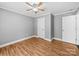 Standard bedroom includes light flooring and white trim and doors at 3546 Mount Pleasant N Rd, Concord, NC 28025