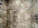Tiled shower with built-in shelving at 3546 Mount Pleasant N Rd, Concord, NC 28025