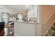 Stylish bar with a granite countertop, bar stools, and cabinetry, perfect for entertaining at 4160 Isle Of Pines Dr, Denver, NC 28037
