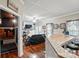 Entertainment area featuring a bar with seating, a living room with a TV and a nearby theater room at 4160 Isle Of Pines Dr, Denver, NC 28037