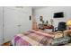 Bright bedroom featuring a large closet, workspace, and modern decor at 4160 Isle Of Pines Dr, Denver, NC 28037