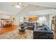 Open-concept living space connecting the living room, dining area, and kitchen, creating an ideal space for entertaining guests at 4160 Isle Of Pines Dr, Denver, NC 28037