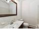 Bright bathroom with a classic vanity, framed mirror, and tile accents at 455 W Gleneagles Rd, Statesville, NC 28625