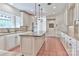 Bright, updated kitchen featuring custom cabinets, granite countertops, stainless steel appliances and large island at 455 W Gleneagles Rd, Statesville, NC 28625