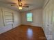 Comfortable bedroom with wood floors, closet and window for natural light at 4787 Rock Barn Rd, Claremont, NC 28610