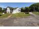 View of a home, driveway, and spacious front yard at 4787 Rock Barn Rd, Claremont, NC 28610