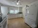 Spacious kitchen with white appliances and ample counter space at 4787 Rock Barn Rd, Claremont, NC 28610