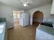 Bright kitchen showing vintage features and access to sunroom at 4787 Rock Barn Rd, Claremont, NC 28610