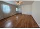 Bright living room with hardwood floors, closet, and natural light at 4787 Rock Barn Rd, Claremont, NC 28610