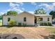 Charming renovated ranch-style home featuring new siding and well-maintained landscaping at 504 N Hawthorne St, Mount Holly, NC 28120