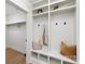 Bright mudroom area offers built-in storage, cubbies and bench with easy access to other rooms at 5514 Milford Rd, Charlotte, NC 28210