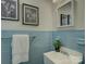 Vintage bathroom features stylish blue tile and updated fixtures at 5601 Londonderry Rd, Charlotte, NC 28210