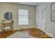 Bedroom with hardwood floors and natural light at 5601 Londonderry Rd, Charlotte, NC 28210