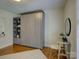 This bedroom features a modern Murphy bed and a charming desk area at 5601 Londonderry Rd, Charlotte, NC 28210