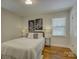 Cozy bedroom featuring natural light and hardwood floors at 5601 Londonderry Rd, Charlotte, NC 28210