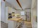 Bright kitchen featuring island, stainless steel appliances, and white cabinets at 5601 Londonderry Rd, Charlotte, NC 28210