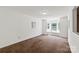 Bedroom with a bay window, a door, and carpet at 6053 Treetop Ct, Charlotte, NC 28212