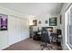 Spacious bedroom featuring carpet, a window, and a closet at 6053 Treetop Ct, Charlotte, NC 28212