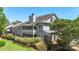 Well-maintained condo featuring a balcony with serene views of lush greenery at 6053 Treetop Ct, Charlotte, NC 28212