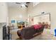Bright and airy living space with a fireplace, vaulted ceilings, and dining area access at 6053 Treetop Ct, Charlotte, NC 28212