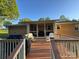 Spacious back deck with porch and outdoor seating area perfect for entertaining guests at 609 E Maine Ave, Bessemer City, NC 28016