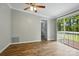 The primary bedroom has a sliding glass door leading to a deck at 621 Harper Davis Rd, Lake Wylie, SC 29710