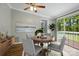 Cozy dining area with a round table and sliding door to back deck at 621 Harper Davis Rd, Lake Wylie, SC 29710