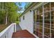 A ground-level deck features a sliding glass door entry to the residence at 621 Harper Davis Rd, Lake Wylie, SC 29710