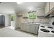 Functional kitchen with ample counter space and white appliances at 621 Harper Davis Rd, Lake Wylie, SC 29710
