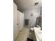 Neutral bathroom featuring a toilet, towel rack, and white shower curtain at 6212 Sunset Cir, Charlotte, NC 28216