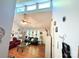 Sunlit living area boasts vaulted ceilings, cozy seating, and stylish decor at 6212 Sunset Cir, Charlotte, NC 28216