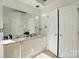 Well-lit bathroom with double sinks and plenty of counter space at 6307 Old Corral St, Charlotte, NC 28277