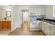 Well-designed kitchen with ample cabinet space, modern appliances, and open access to other living areas at 6307 Old Corral St, Charlotte, NC 28277