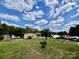 Expansive backyard, with mature landscaping, a deck, and a shed at 6401 Alley Rd, Catawba, NC 28609
