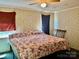 The bedroom has floral wallpaper, green carpet, and a double window at 6401 Alley Rd, Catawba, NC 28609