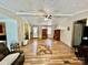 Open-concept living room with wood floors and neutral paint at 6401 Alley Rd, Catawba, NC 28609