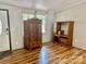 Partially furnished living room showcases light wood-look flooring, natural light, and neutral-colored walls at 6401 Alley Rd, Catawba, NC 28609