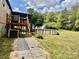Backyard features an above-ground pool and wooden deck offering a relaxing outdoor retreat in this charming home at 6401 Alley Rd, Catawba, NC 28609