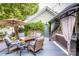 Inviting backyard patio with outdoor seating, fire pit, umbrella, and charming gazebo with curtains at 6726 Park Meadows Pl, Huntersville, NC 28078