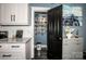 Bright kitchen with granite countertops, pantry access, and stylish decor at 6726 Park Meadows Pl, Huntersville, NC 28078